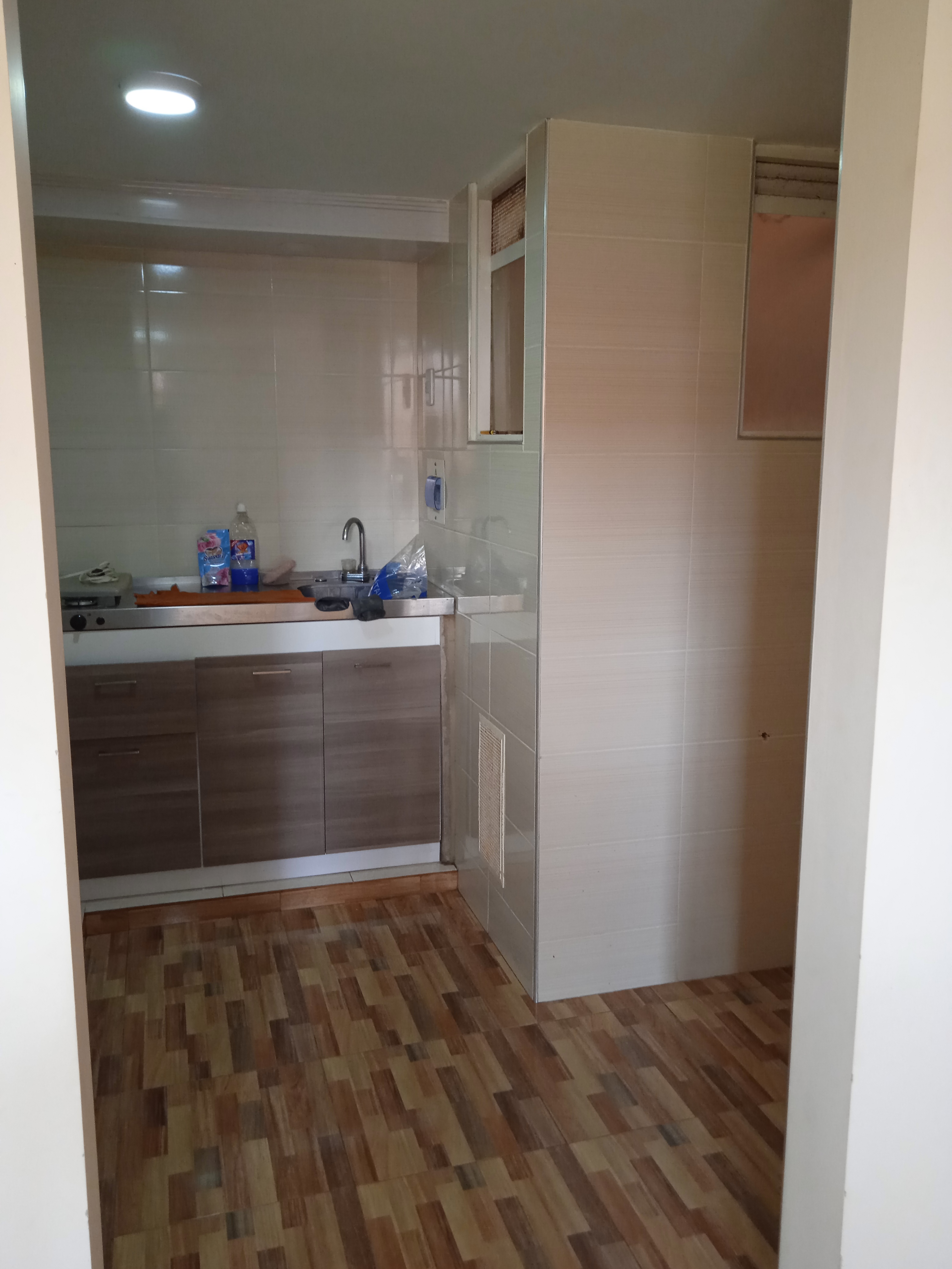 Cocina y zona de ropas